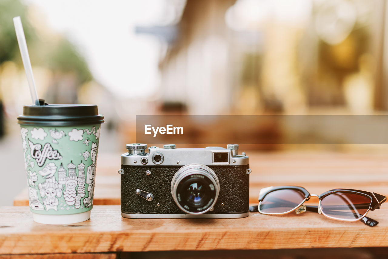Close-up of camera on table