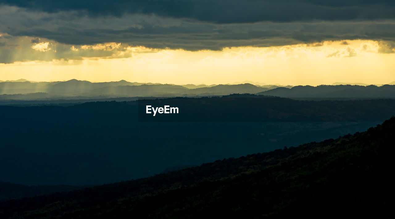 Panoramic landscape of mountain ridges with sunset sky and cloud at a national park of thailand