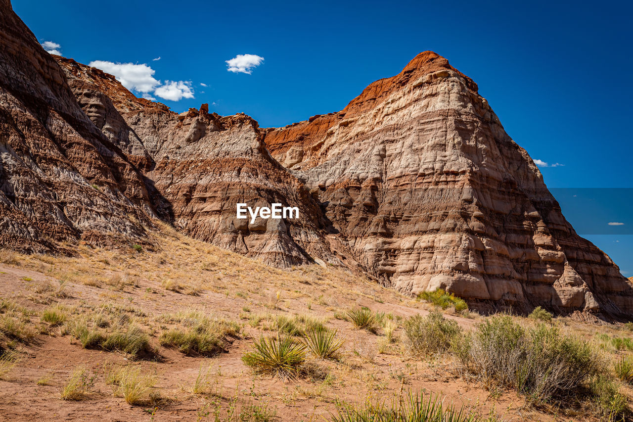 SCENIC VIEW OF ROCK FORMATIONS AGAINST SKY