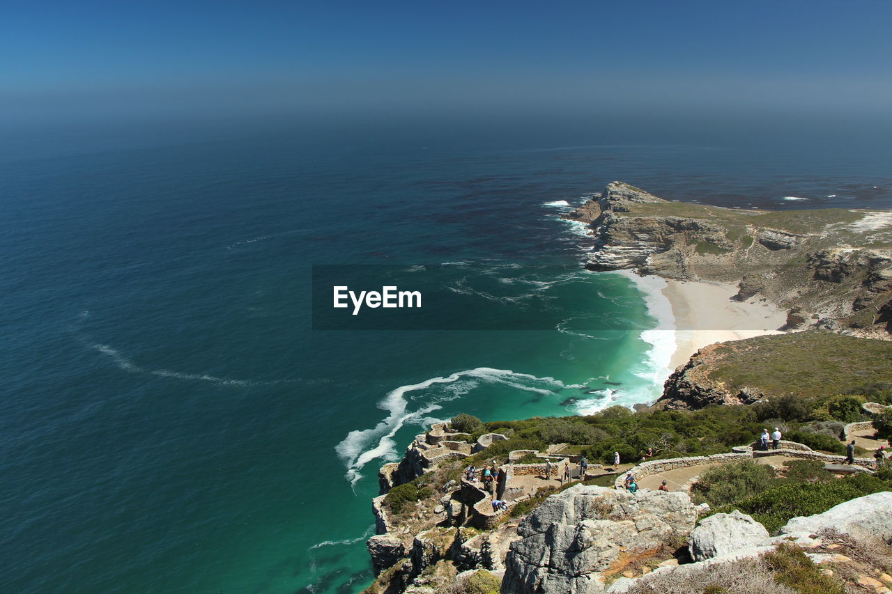 High angle view of sea against blue sky