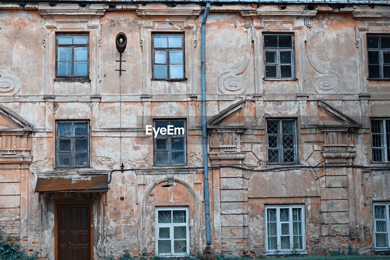 Low angle view of old building in city