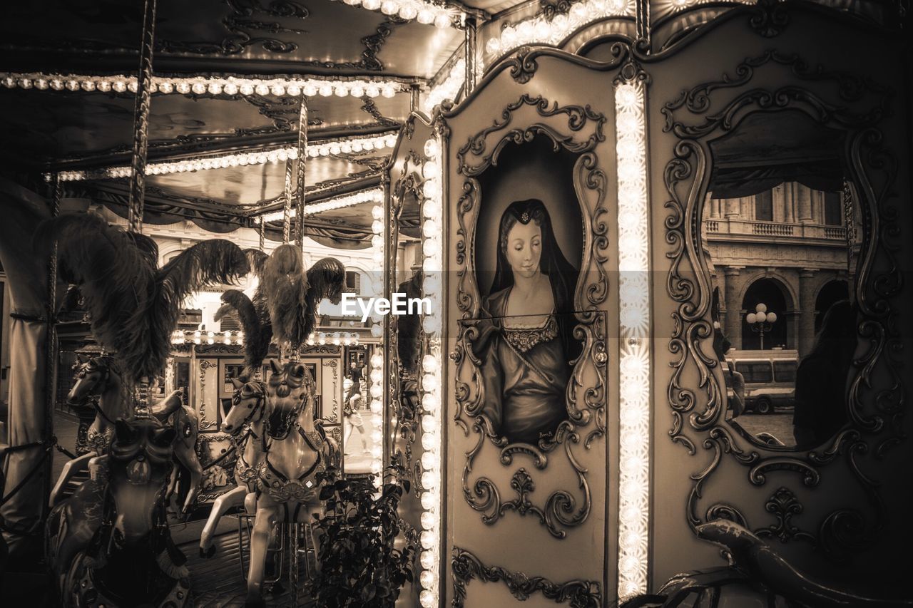 Picture frame in carousel at amusement park