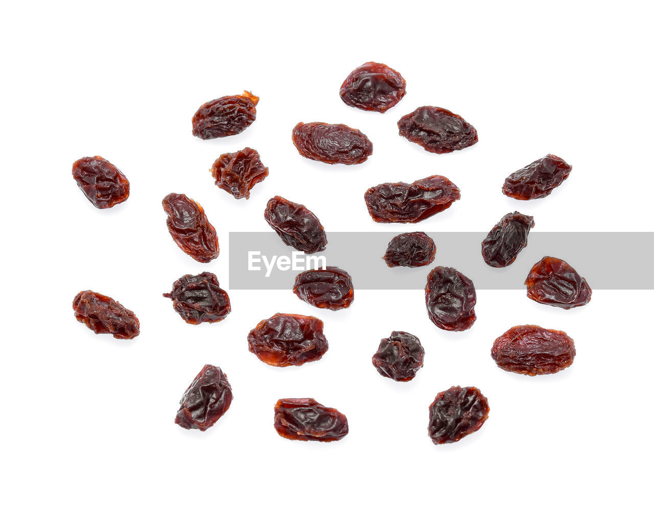 Close-up of raisins against white background