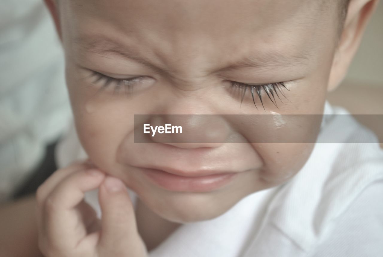 Close-up portrait of crying boy