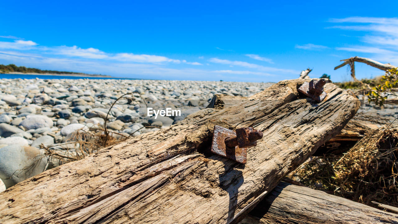 Scenic view of landscape against blue sky