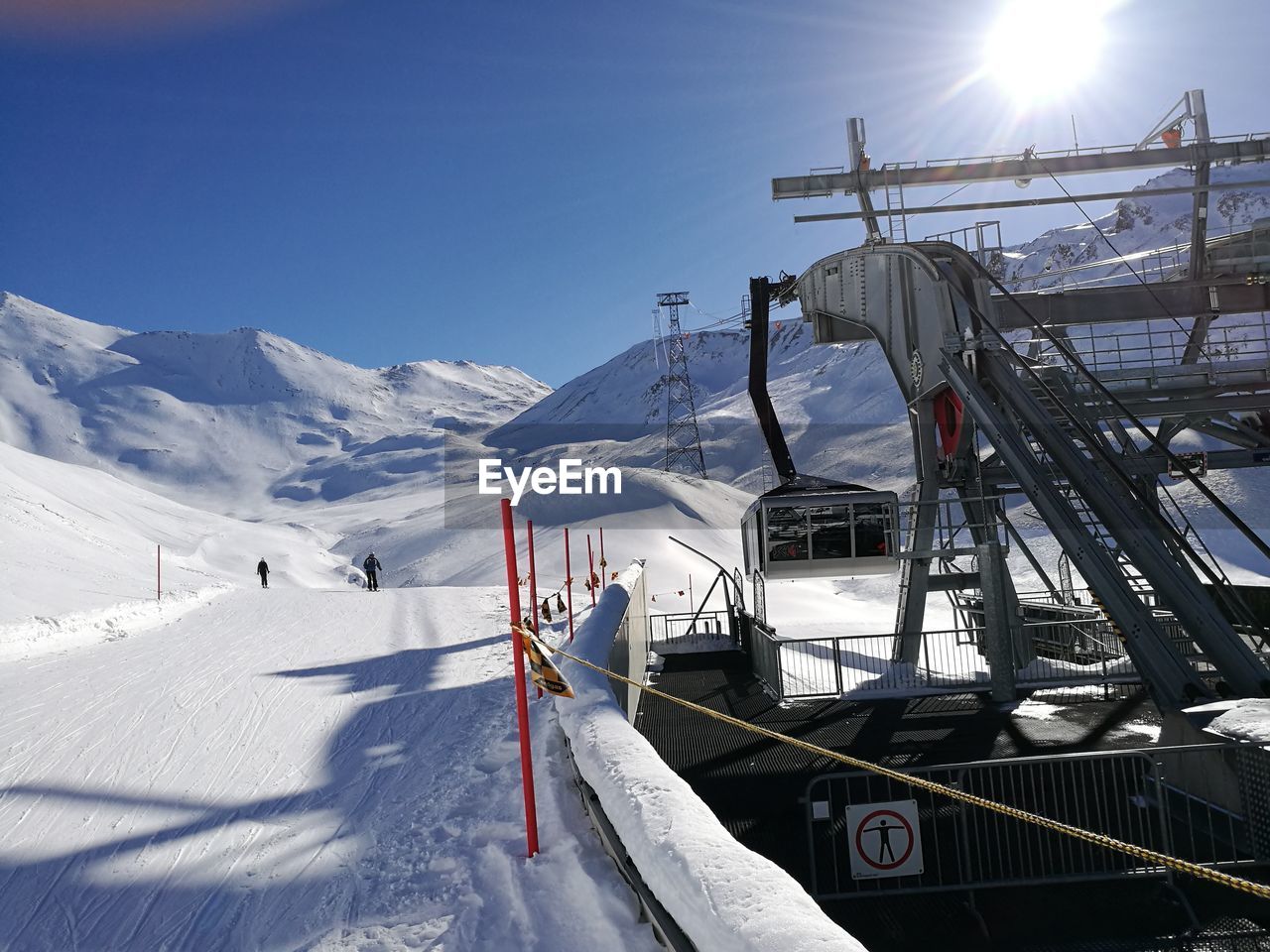 VIEW OF SKI LIFT IN SNOW