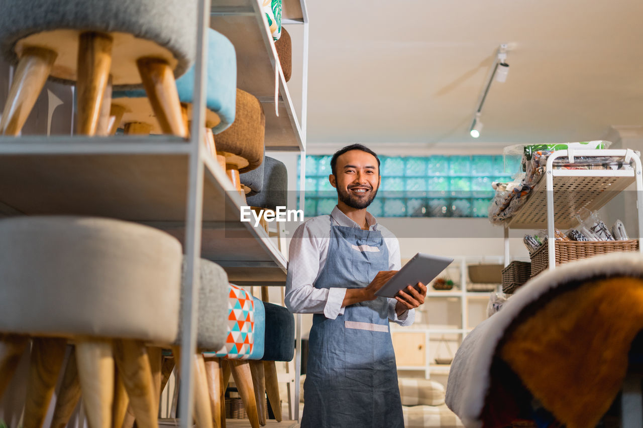 low angle view of people working at table