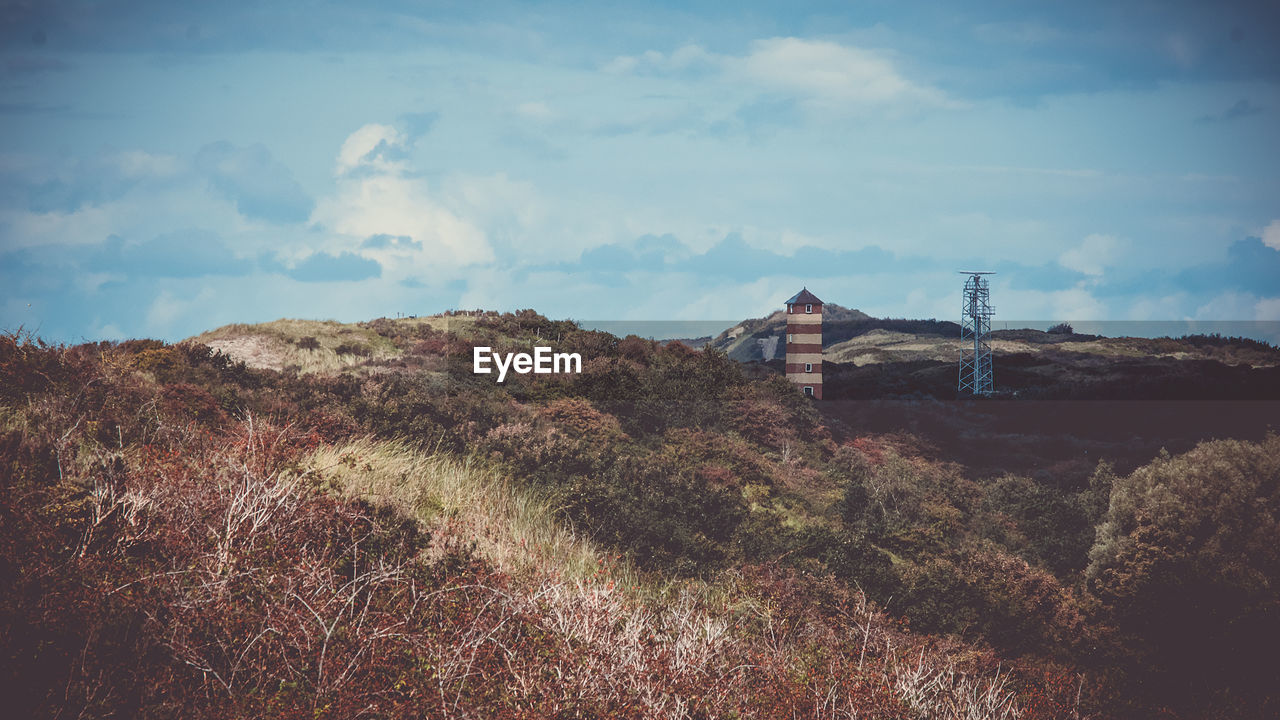 SCENIC VIEW OF MOUNTAIN AGAINST SKY