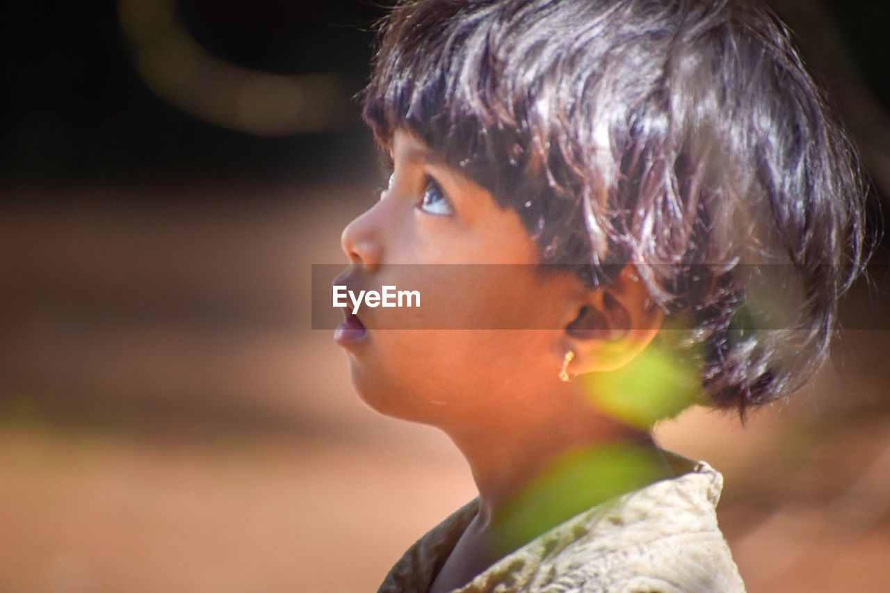 childhood, child, one person, portrait, headshot, close-up, looking, hairstyle, side view, innocence, person, cute, profile view, serious, focus on foreground, portrait photography, looking away, men, emotion, contemplation, female, human hair, human face, nature, outdoors, women