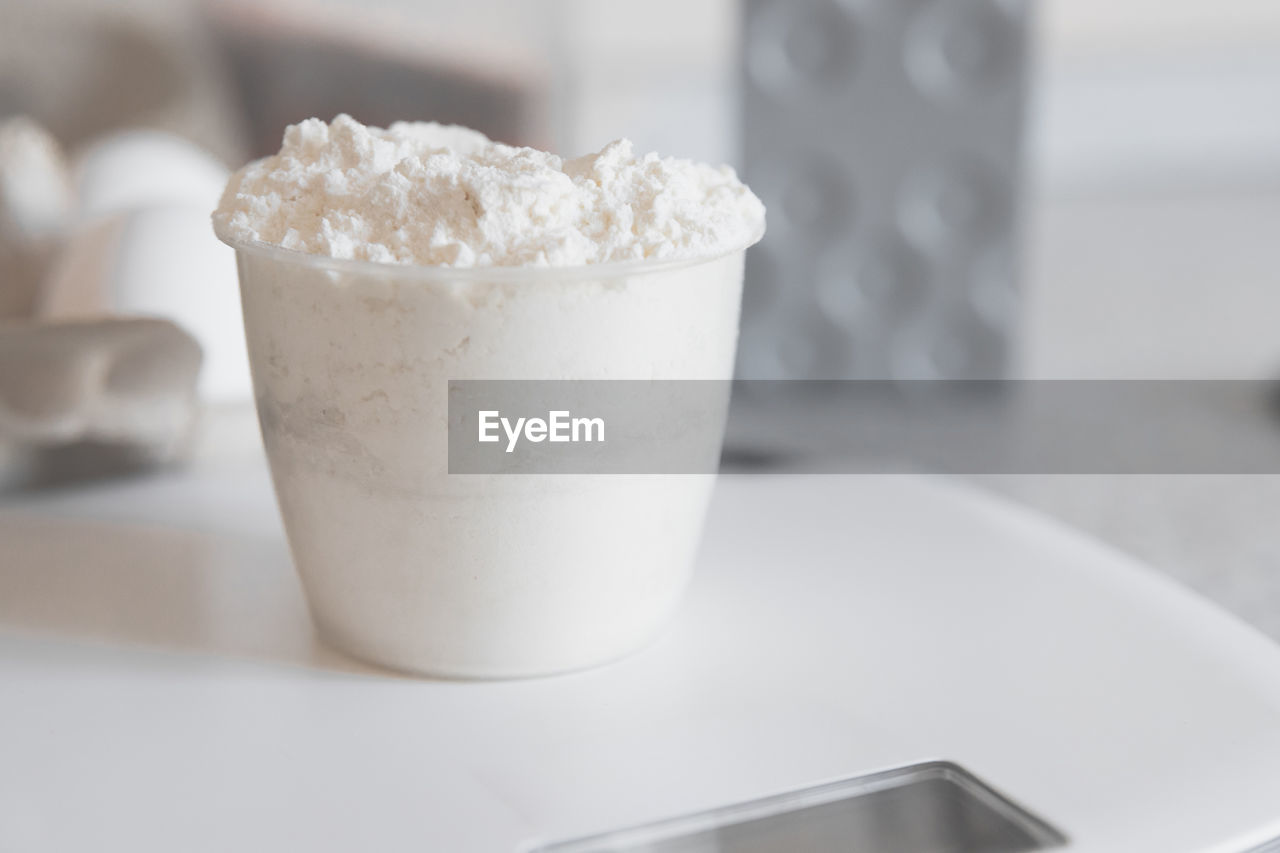 close-up of ice cream in glass on table