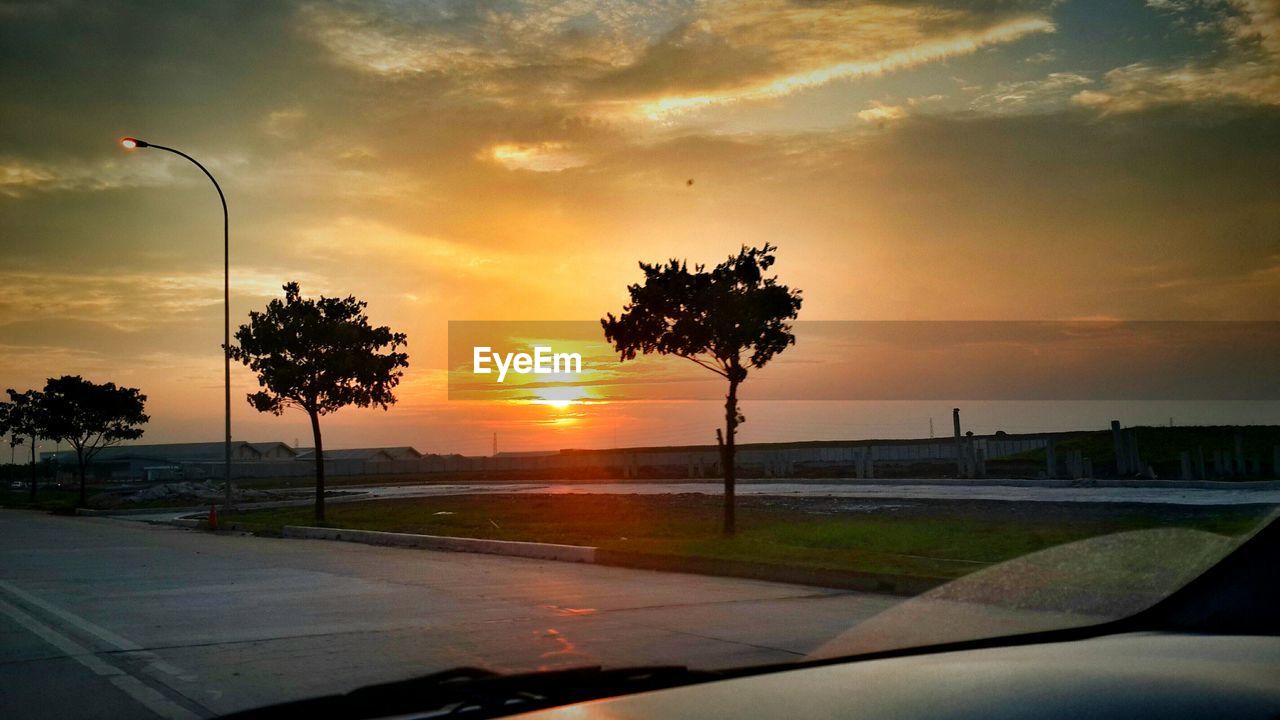 Sunset seen from car