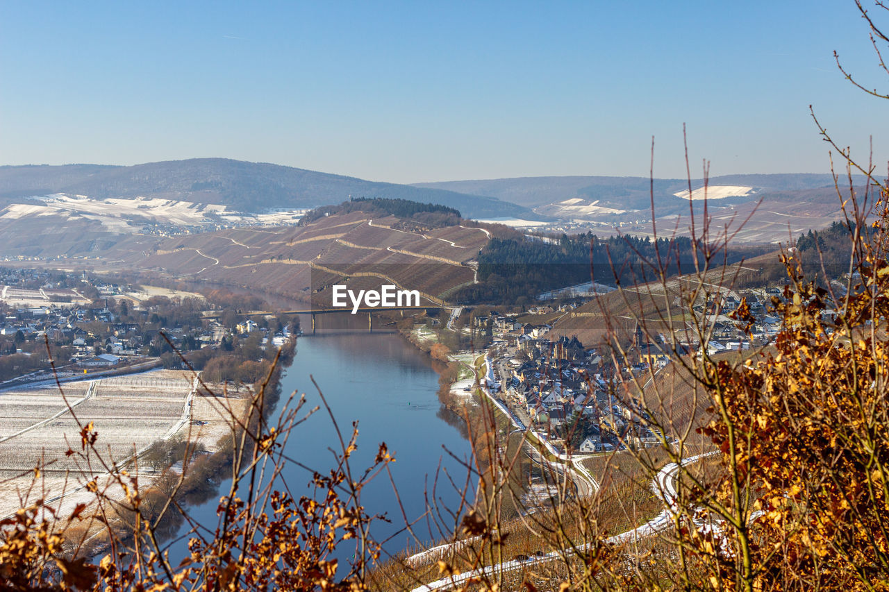 View on the valley of the river moselle, germany in winter with snow