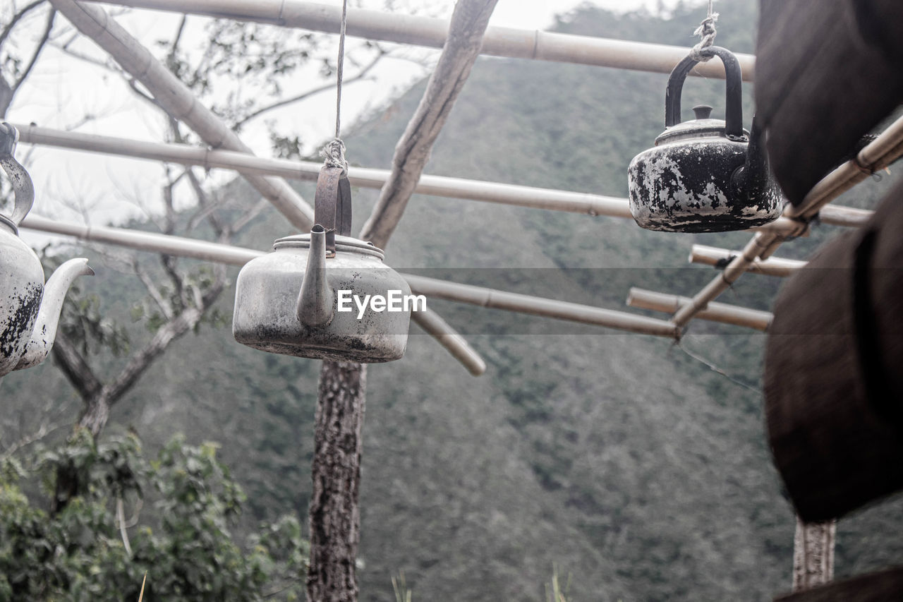 Close-up of padlocks on railing