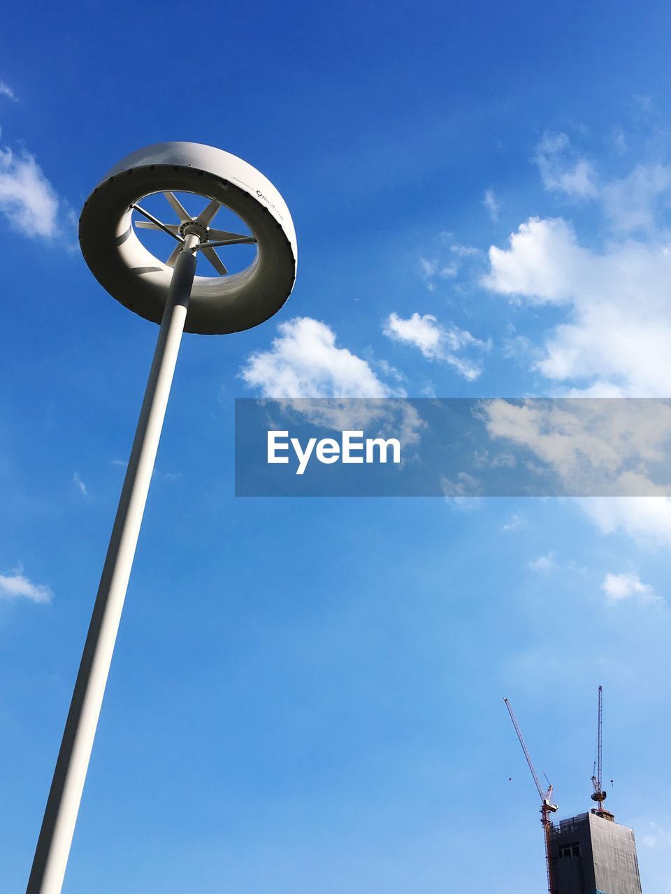 LOW ANGLE VIEW OF TELEPHONE POLE AGAINST SKY