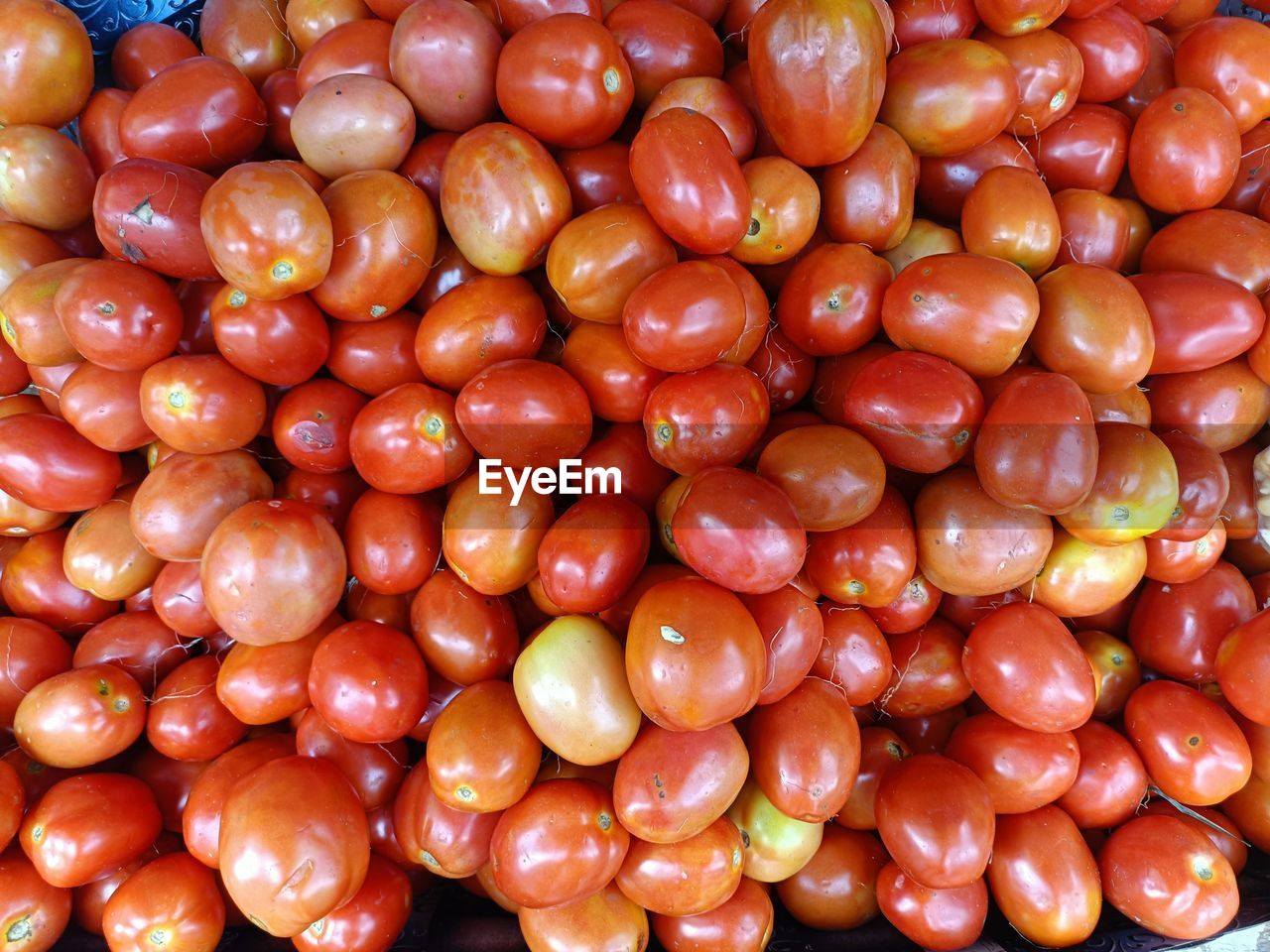 Full frame shot of tomatoes at market stall