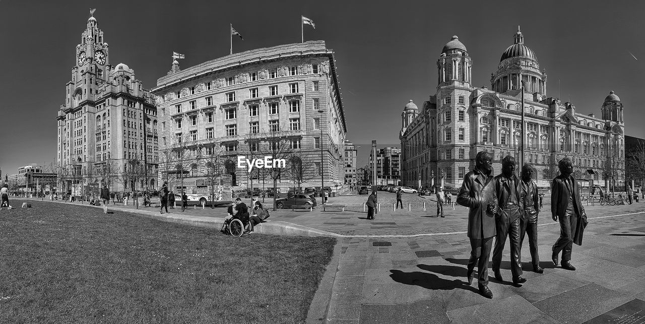  three graces liverpool and you have the beatles statues in foreground