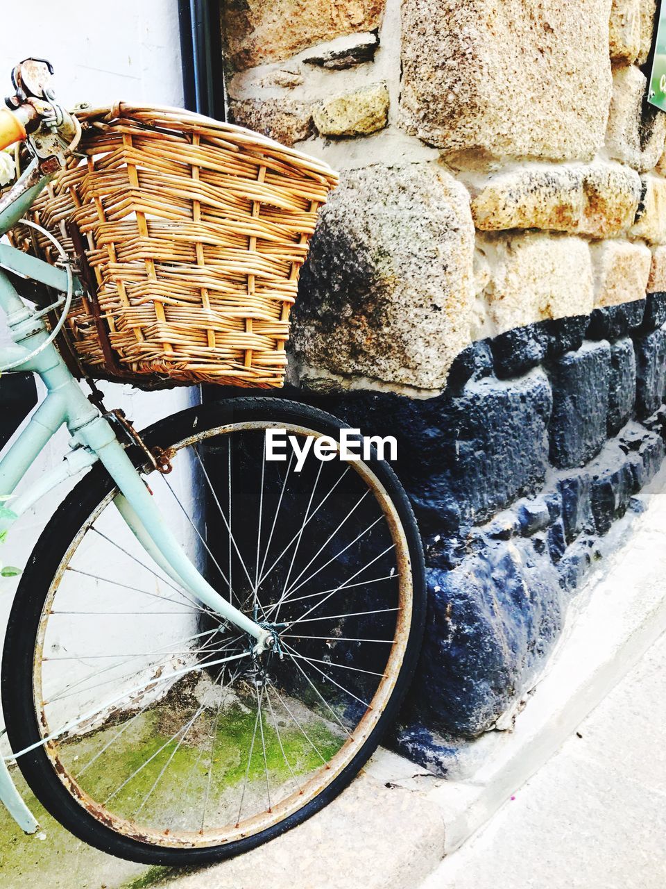 BICYCLE IN BASKET ON VEHICLE