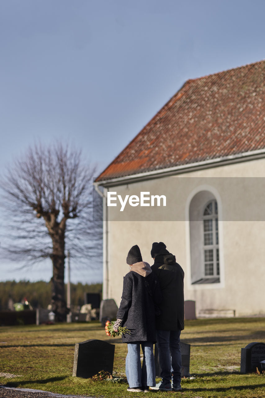 Couple at cemetery