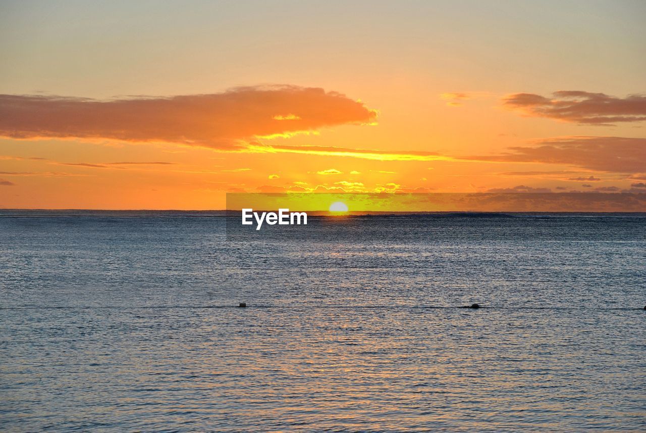 VIEW OF SEA AT SUNSET