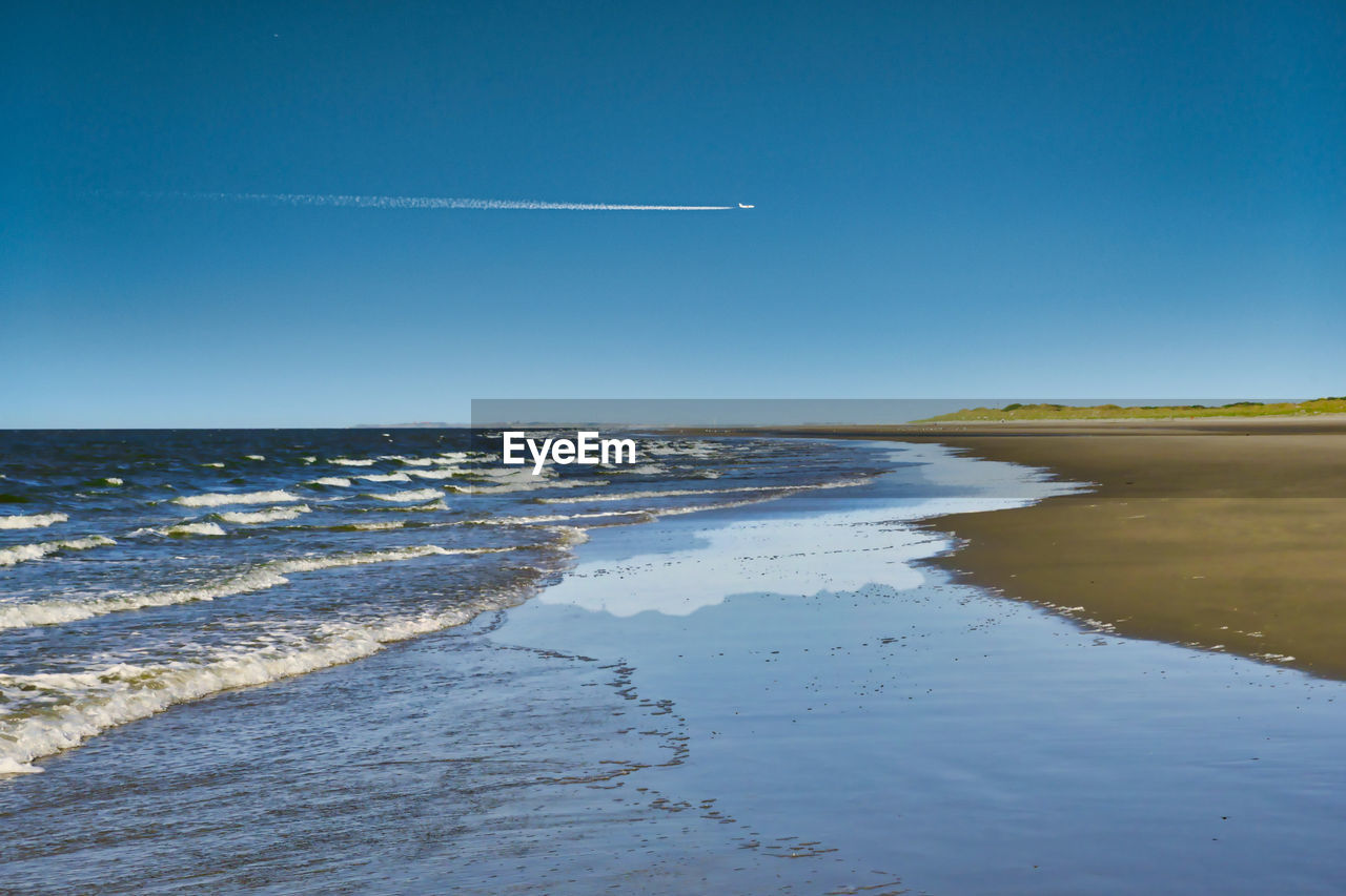 SCENIC VIEW OF SEA AGAINST BLUE SKY