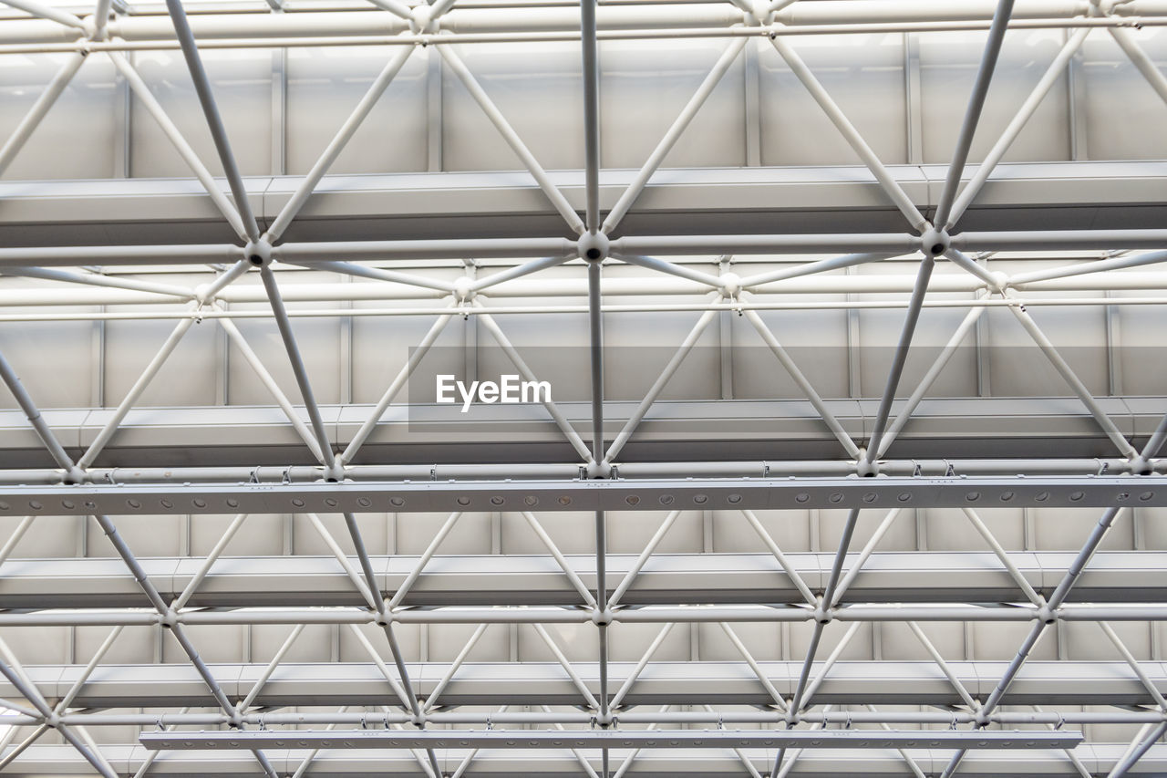 Low angle view of seamless metal structure ceiling of narita airport. 