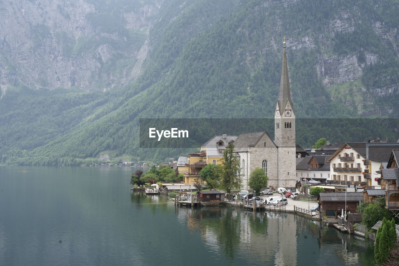 scenic view of lake by mountain