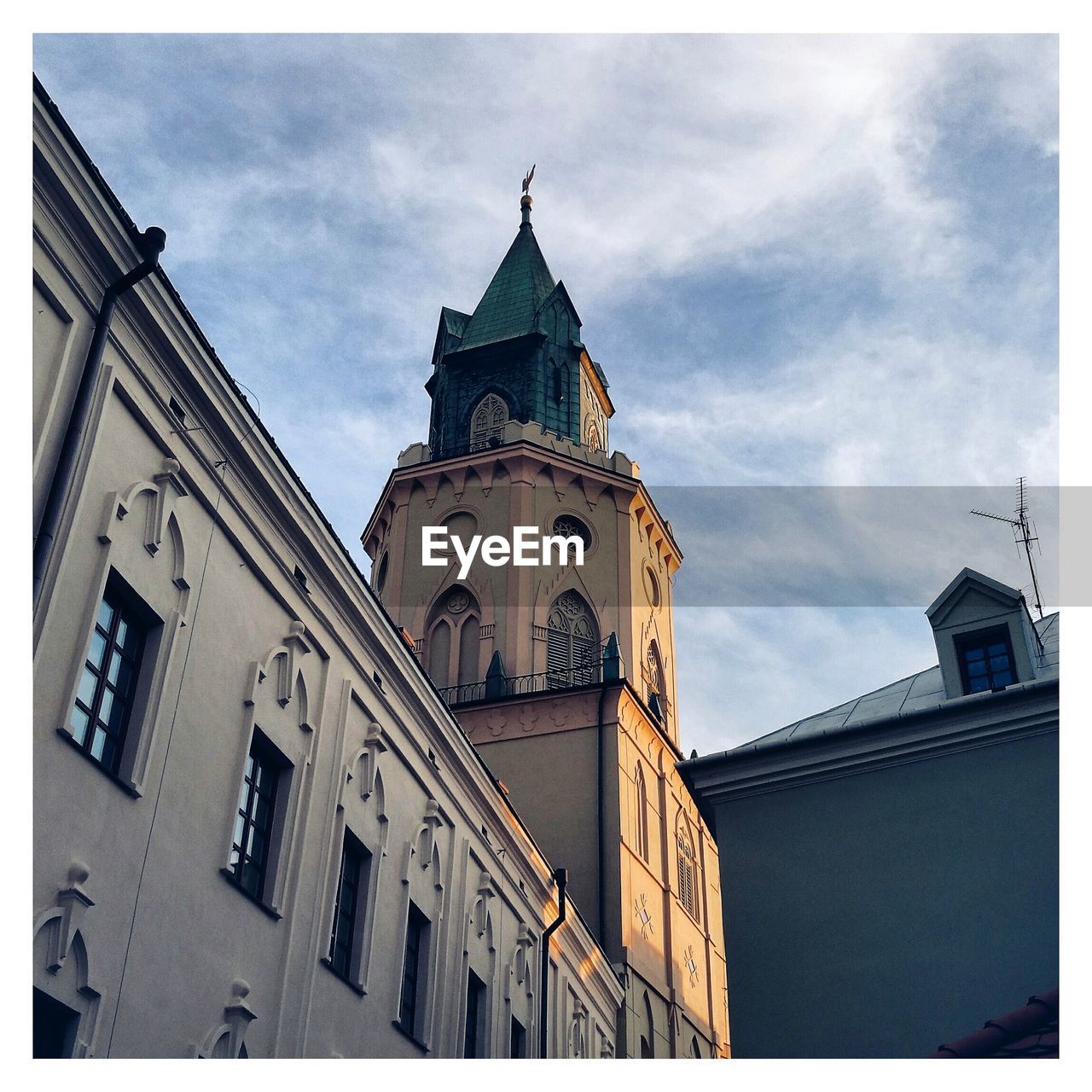 LOW ANGLE VIEW OF CLOCK TOWER