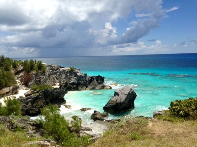 SCENIC VIEW OF SEA WITH ROCKS IN BACKGROUND