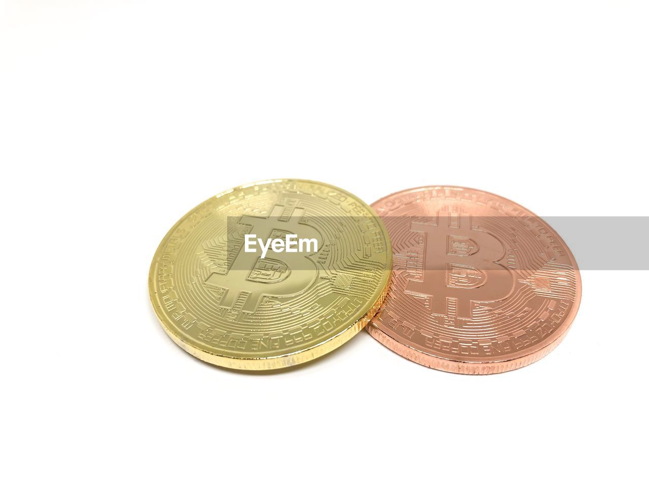 High angle view of coins on white background