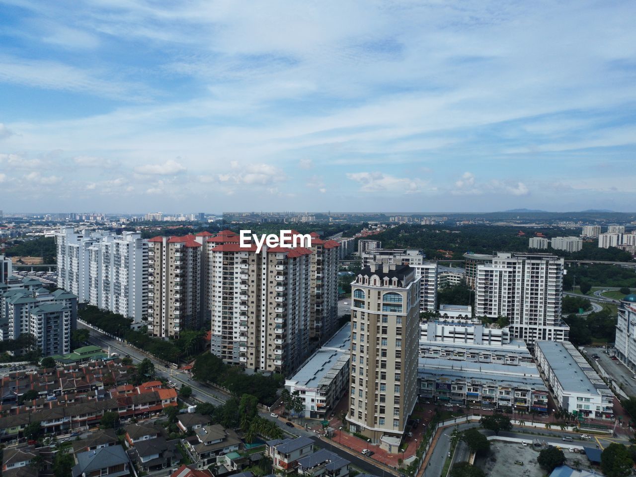 High angle view of buildings in city against sky