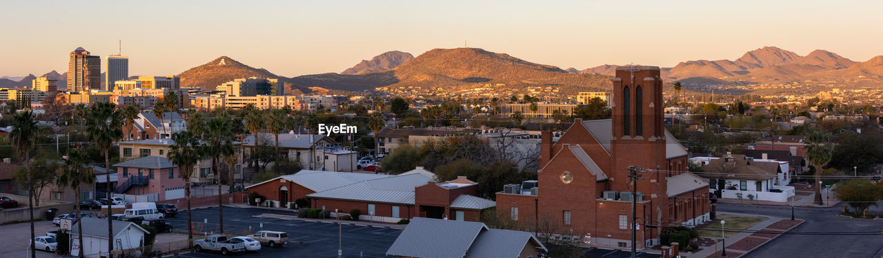 Tucson skyline at dawn with morning sun lighting the mountains