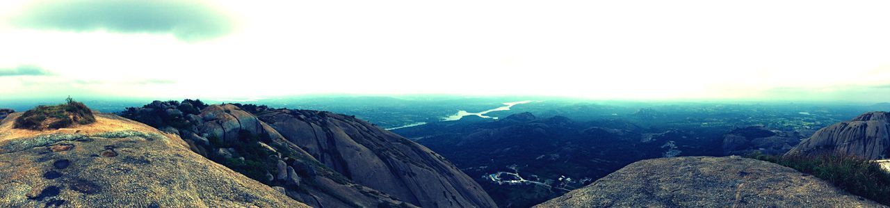 PANORAMIC VIEW OF MOUNTAIN AGAINST SKY