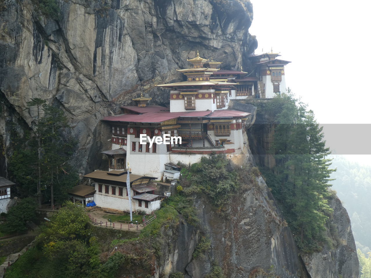 VIEW OF BUILDINGS AGAINST MOUNTAIN