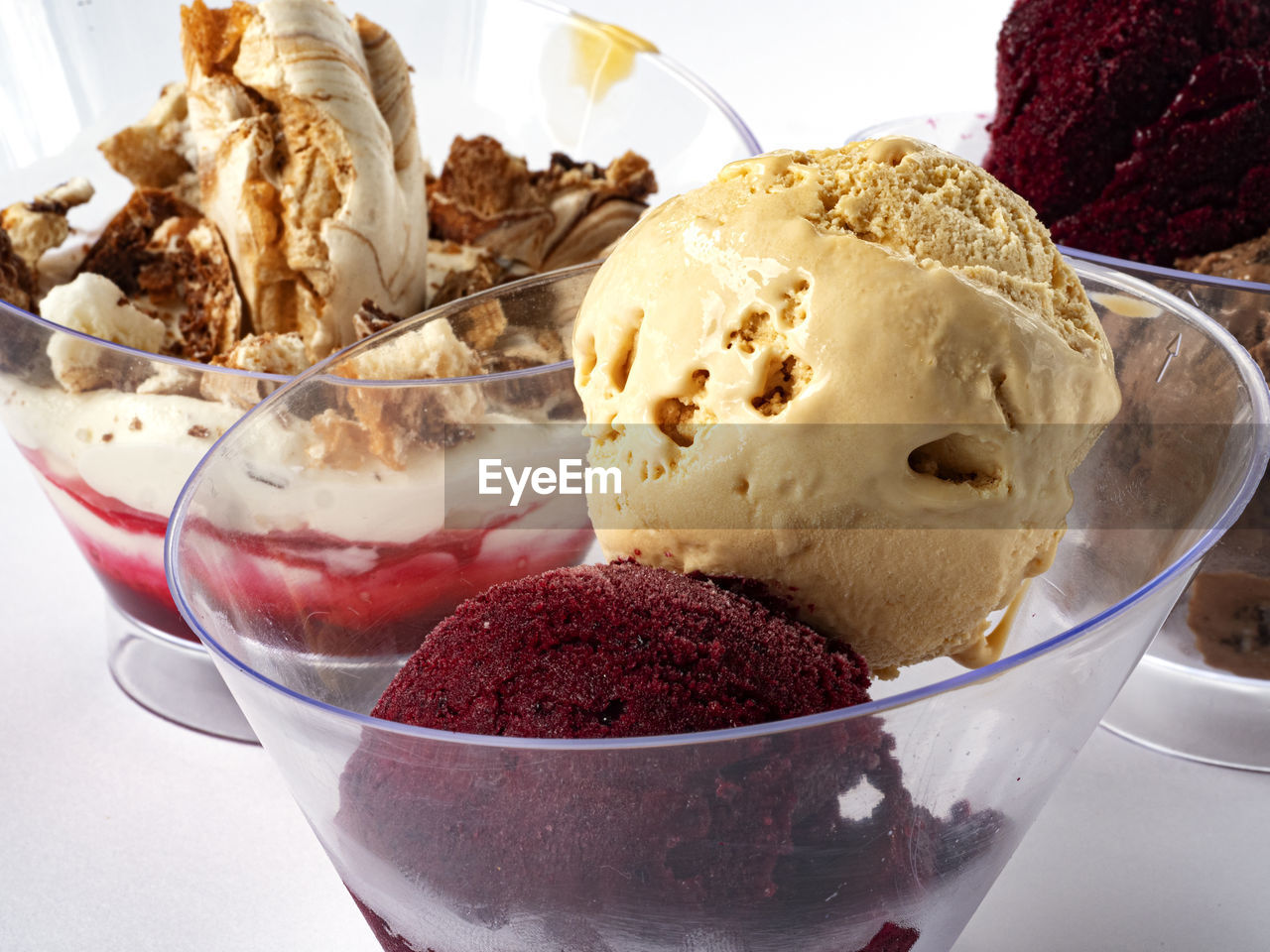 CLOSE-UP OF ICE CREAM IN GLASS BOWL ON TABLE