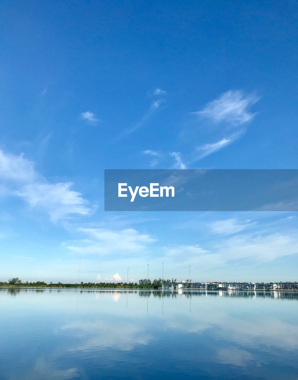 REFLECTION OF CLOUDS IN LAKE