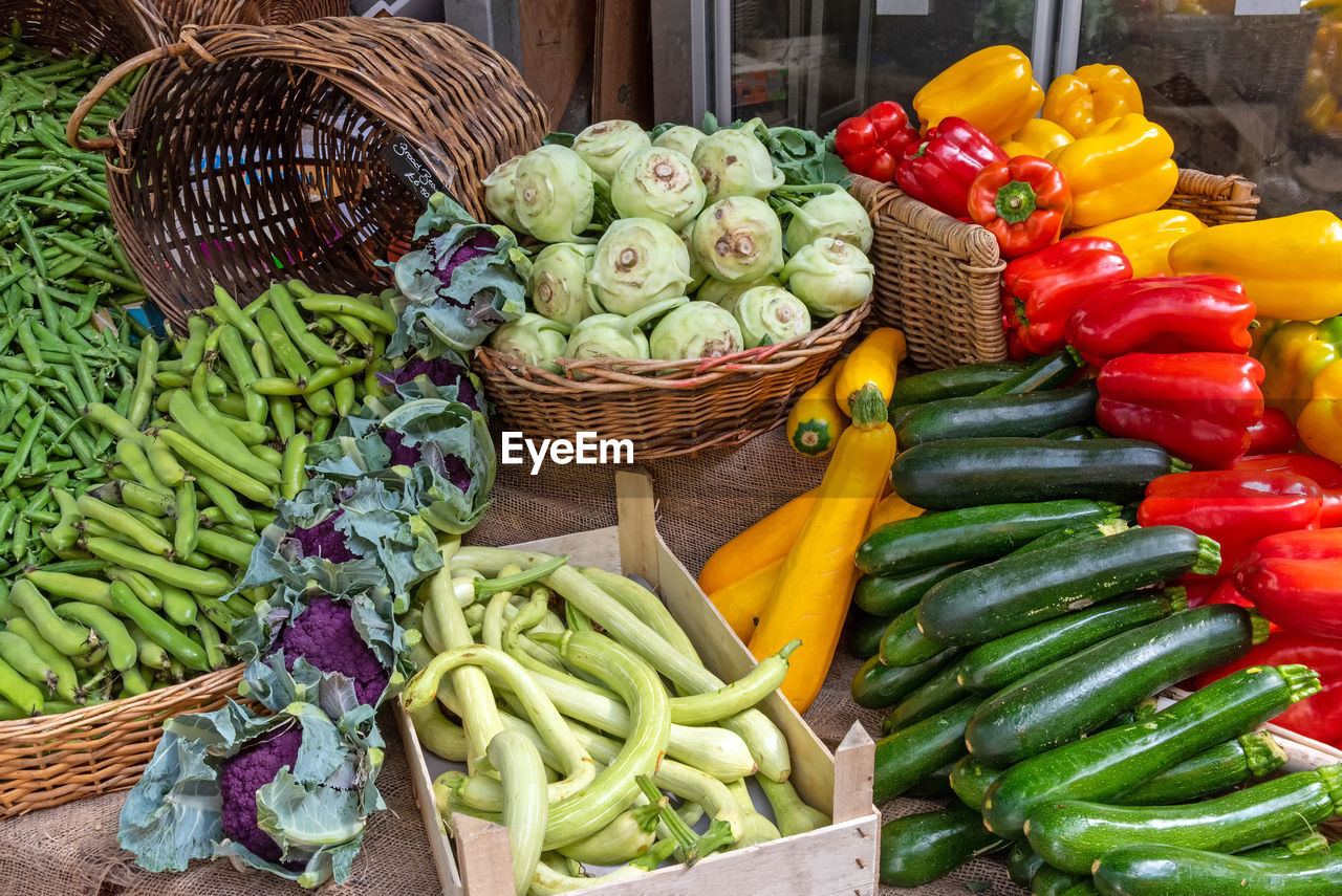 Courgettes, kohlrabi and other vegetables for sale at a market in brixton, london