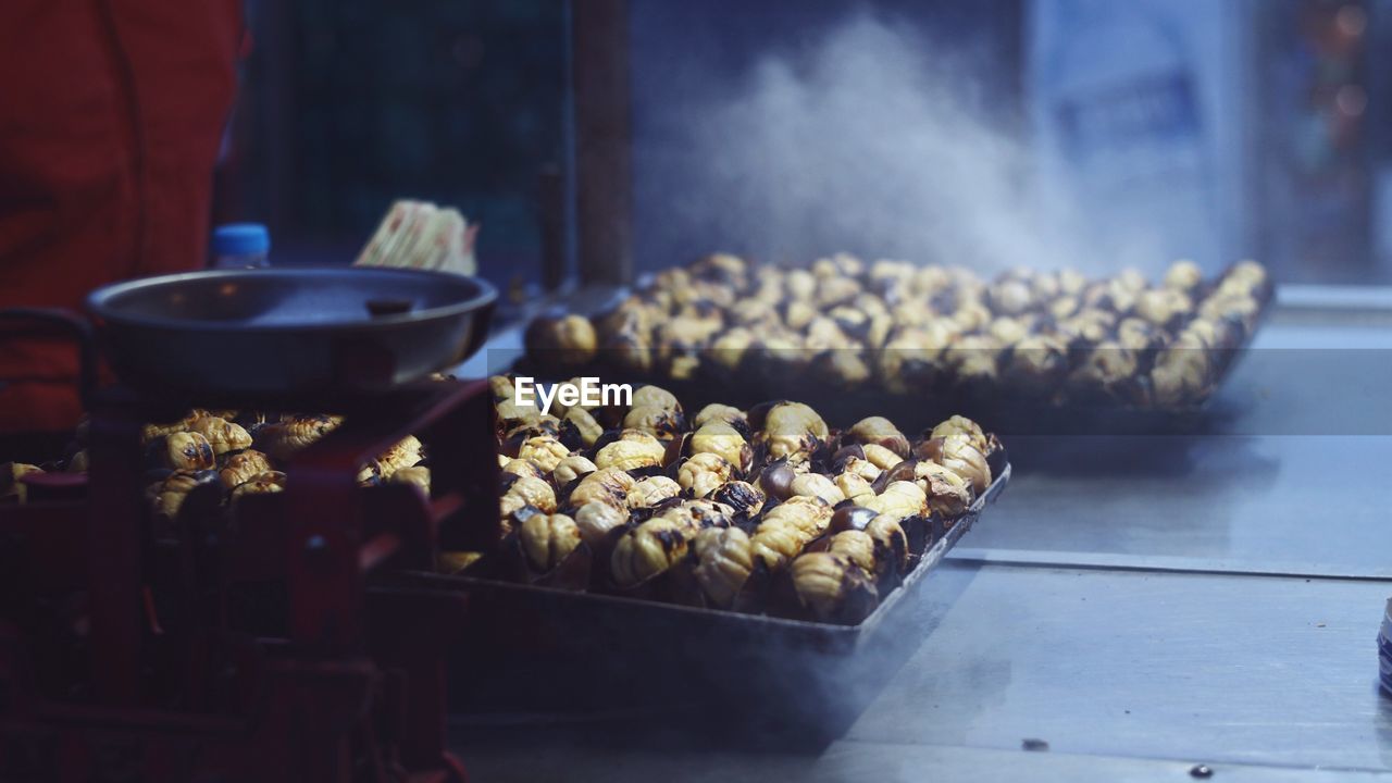 CLOSE-UP OF MEAT ON TABLE