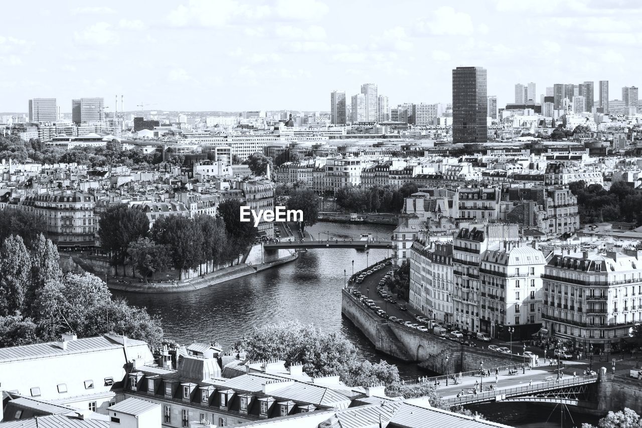 High angle view of river amidst buildings in city