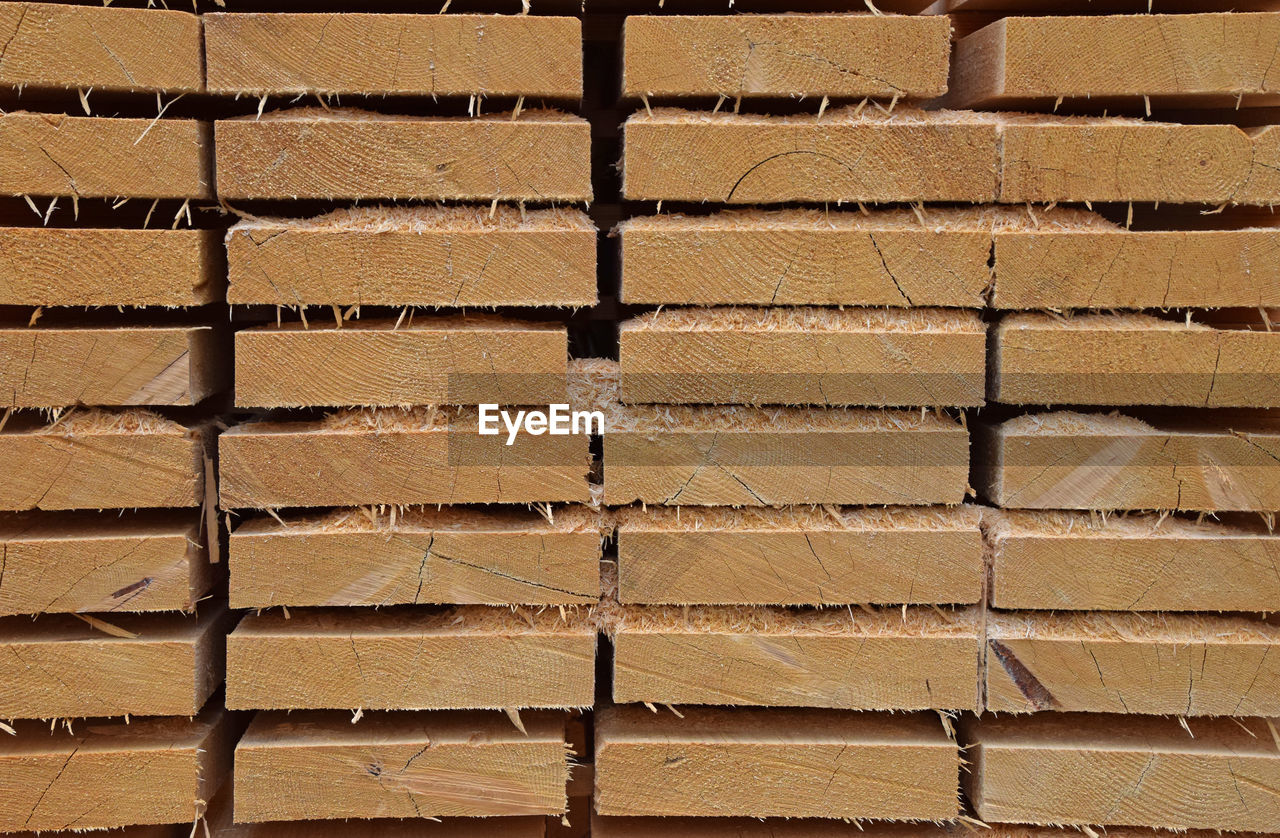 Full frame shot of wooden planks in lumber yard