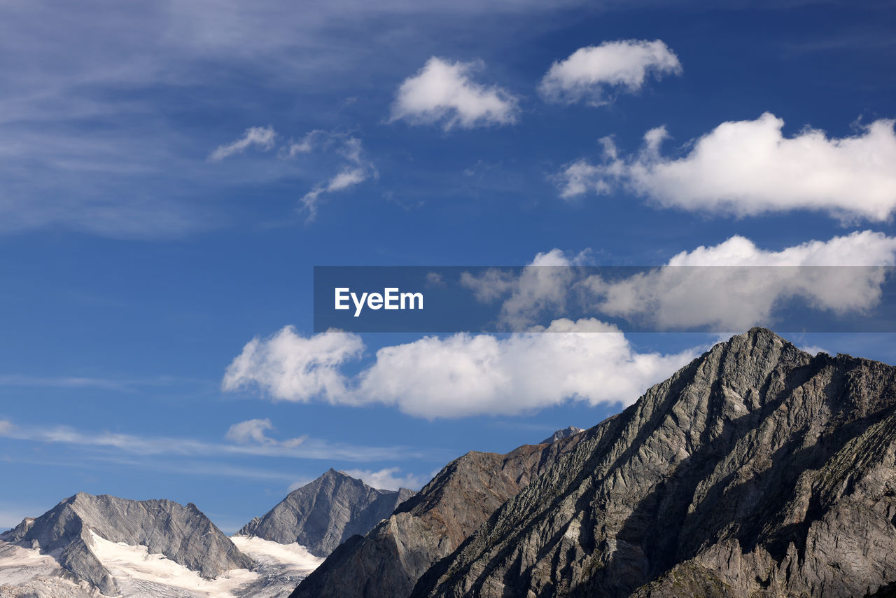 panoramic view of mountains against sky