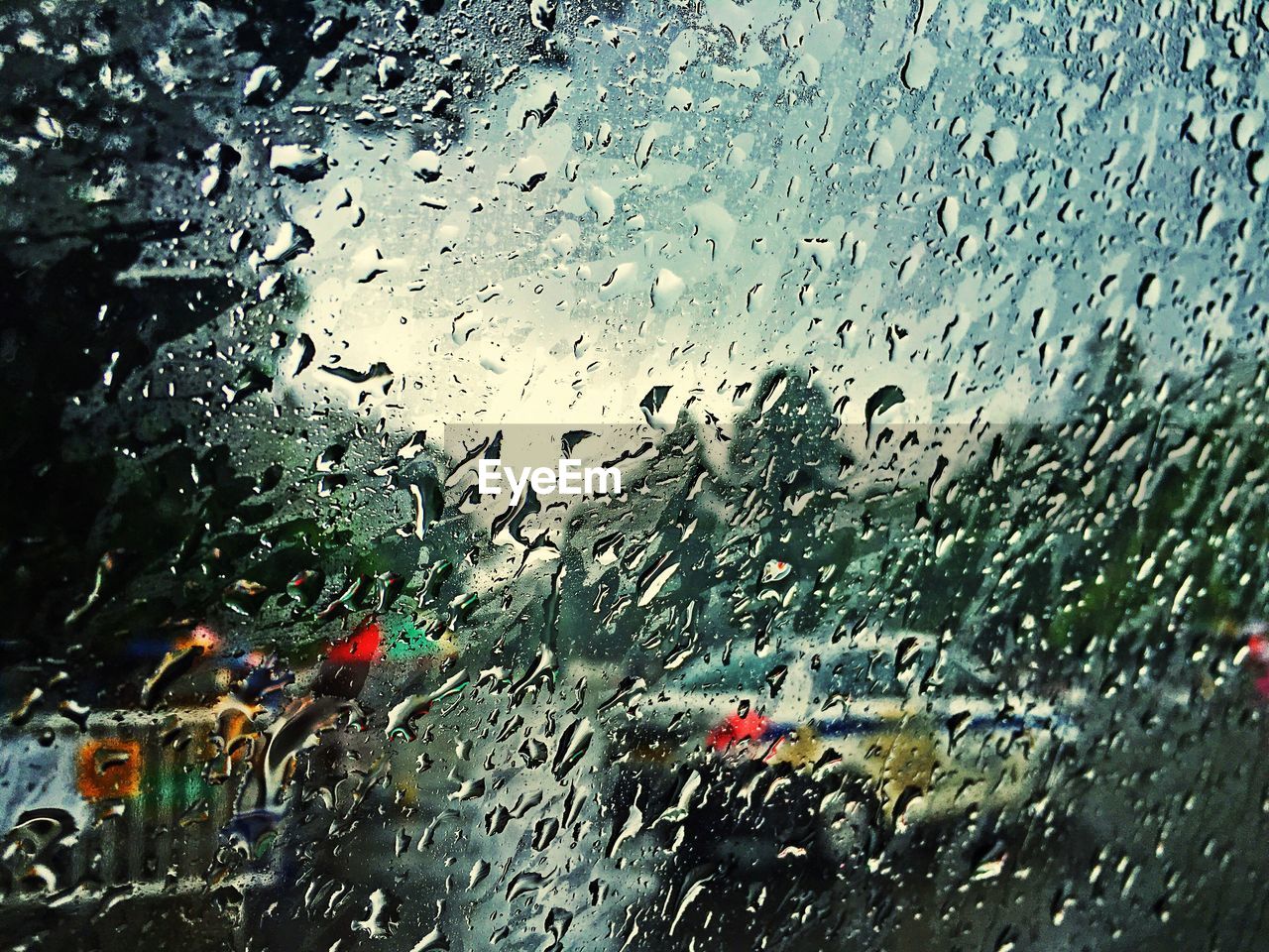 VIEW OF RAIN DROPS ON GLASS