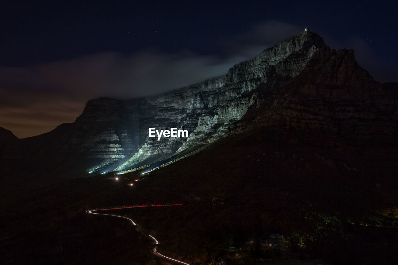 Scenic view of table mountain against sky at night