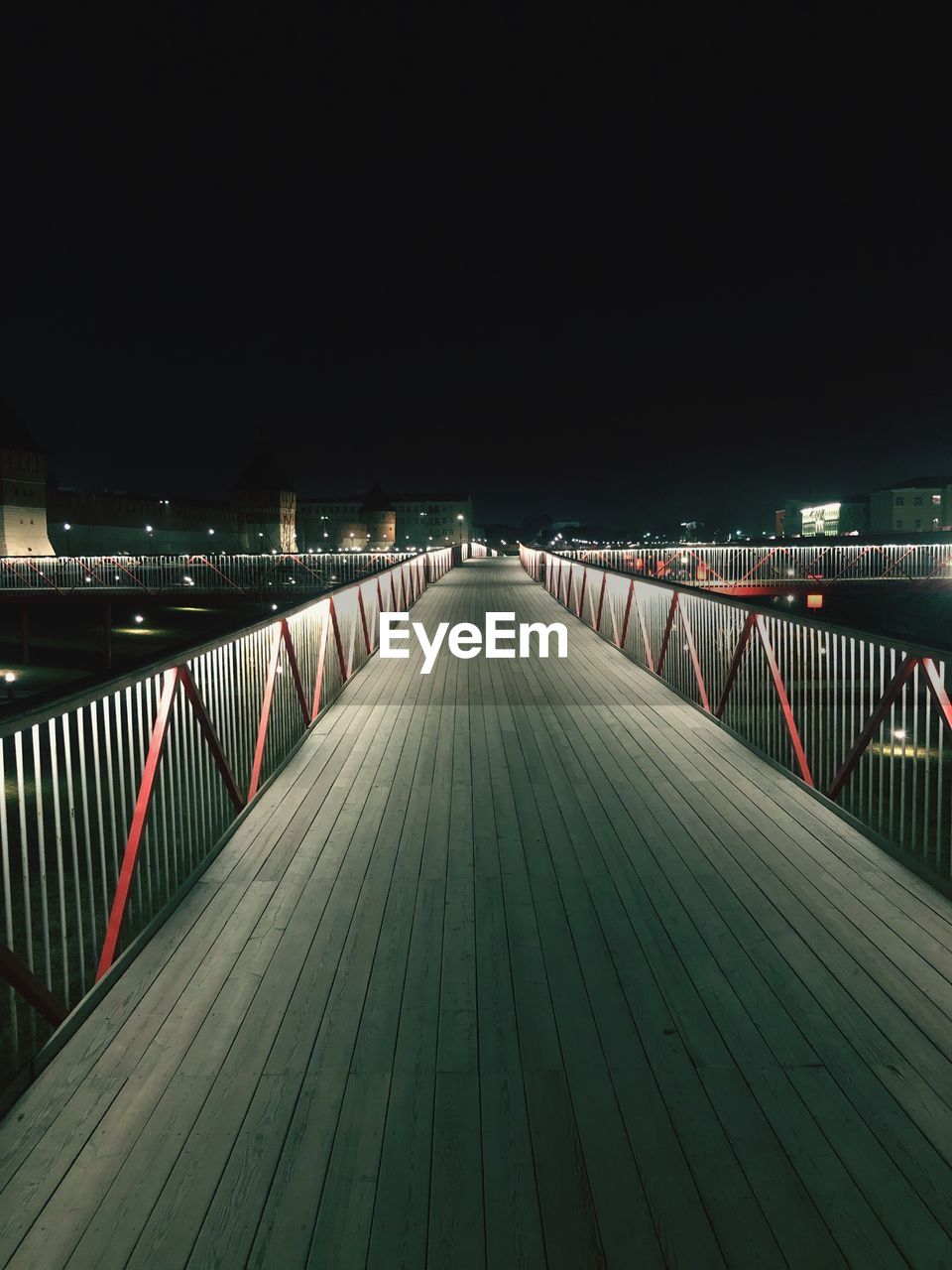 Empty footbridge at night