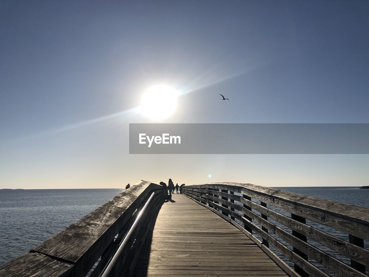 PIER OVER SEA AGAINST SKY