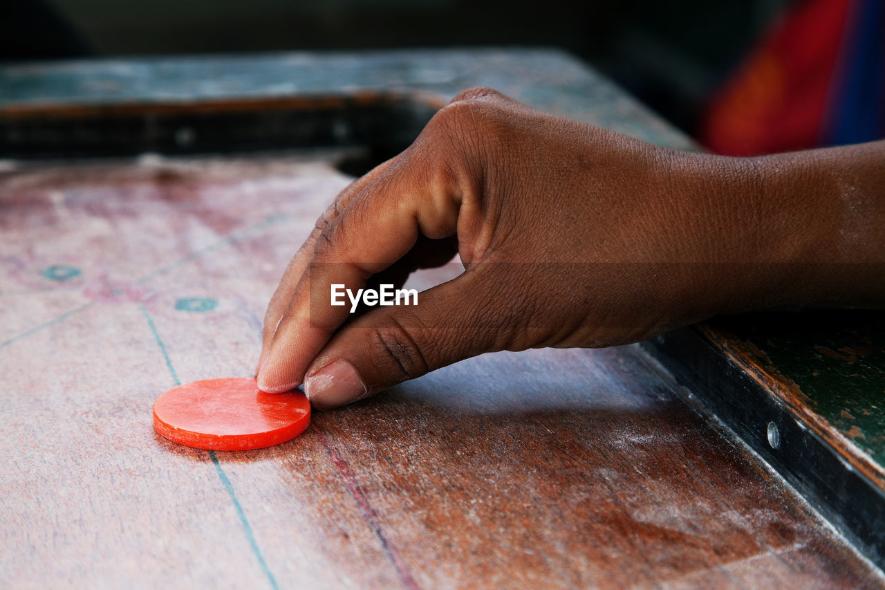 Detail shot of playing carom board