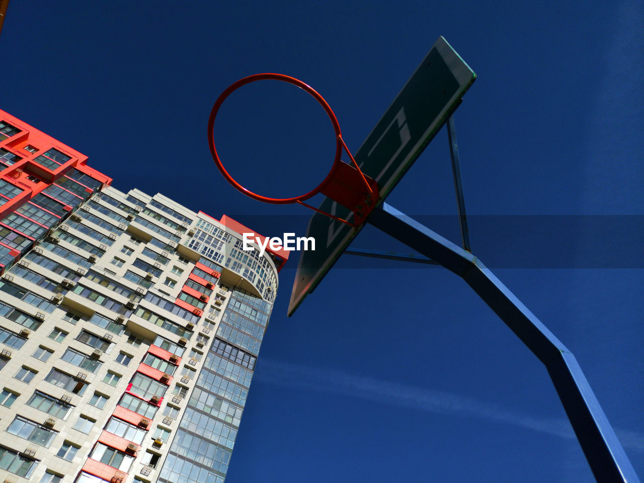 Low angle view of basketball hoop against sky