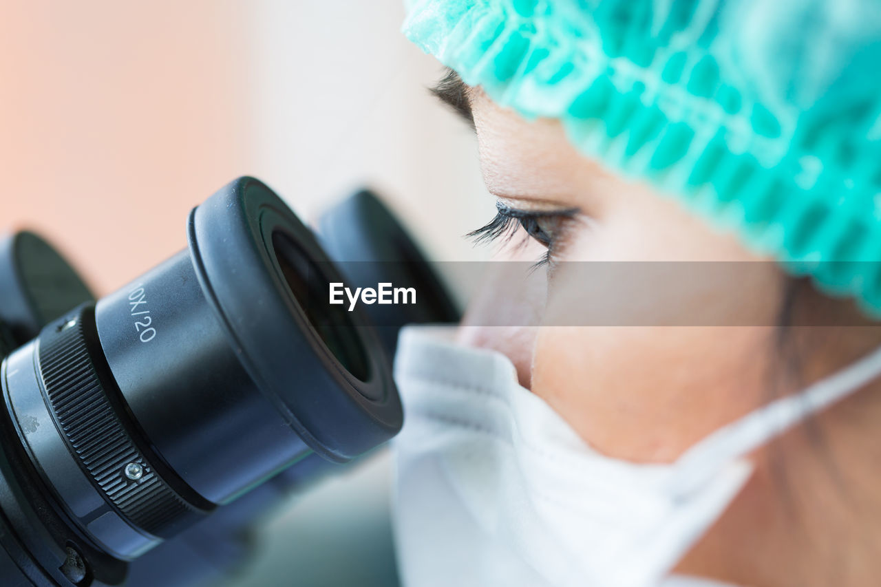 Close-up of woman working in laboratory