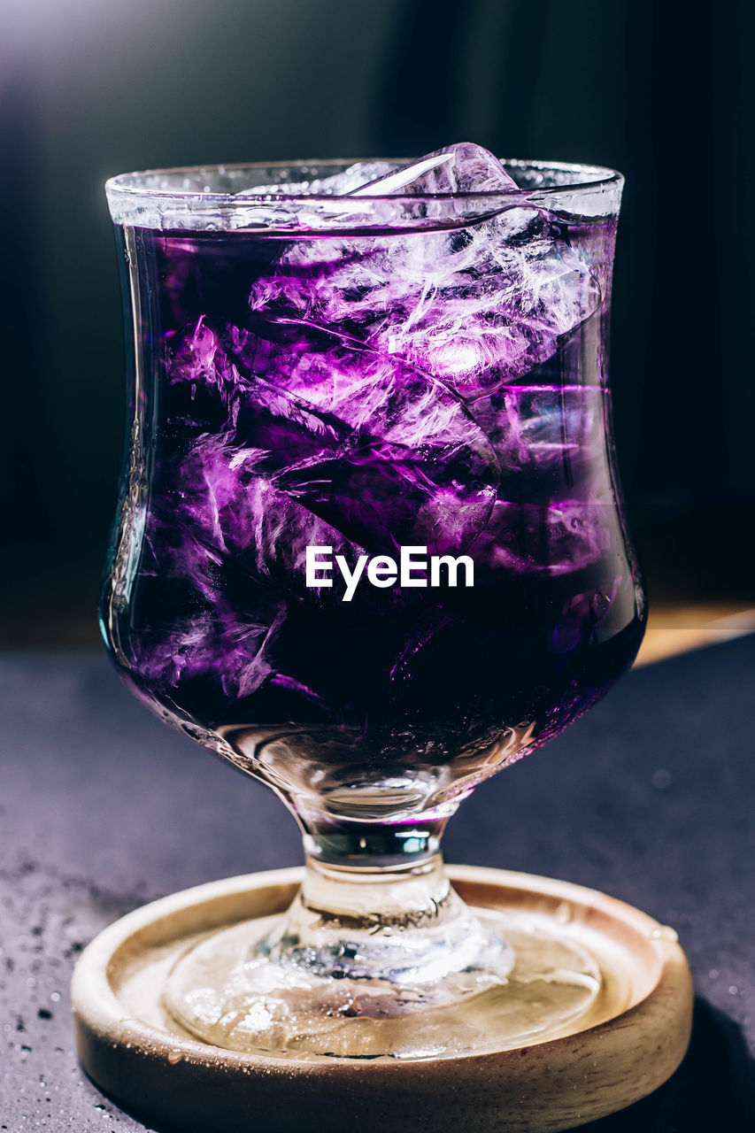 purple, food and drink, glass, violet, drink, drinking glass, refreshment, cobalt blue, household equipment, freshness, alcohol, indoors, food, alcoholic beverage, no people, close-up, stemware, wine glass, still life, cold temperature