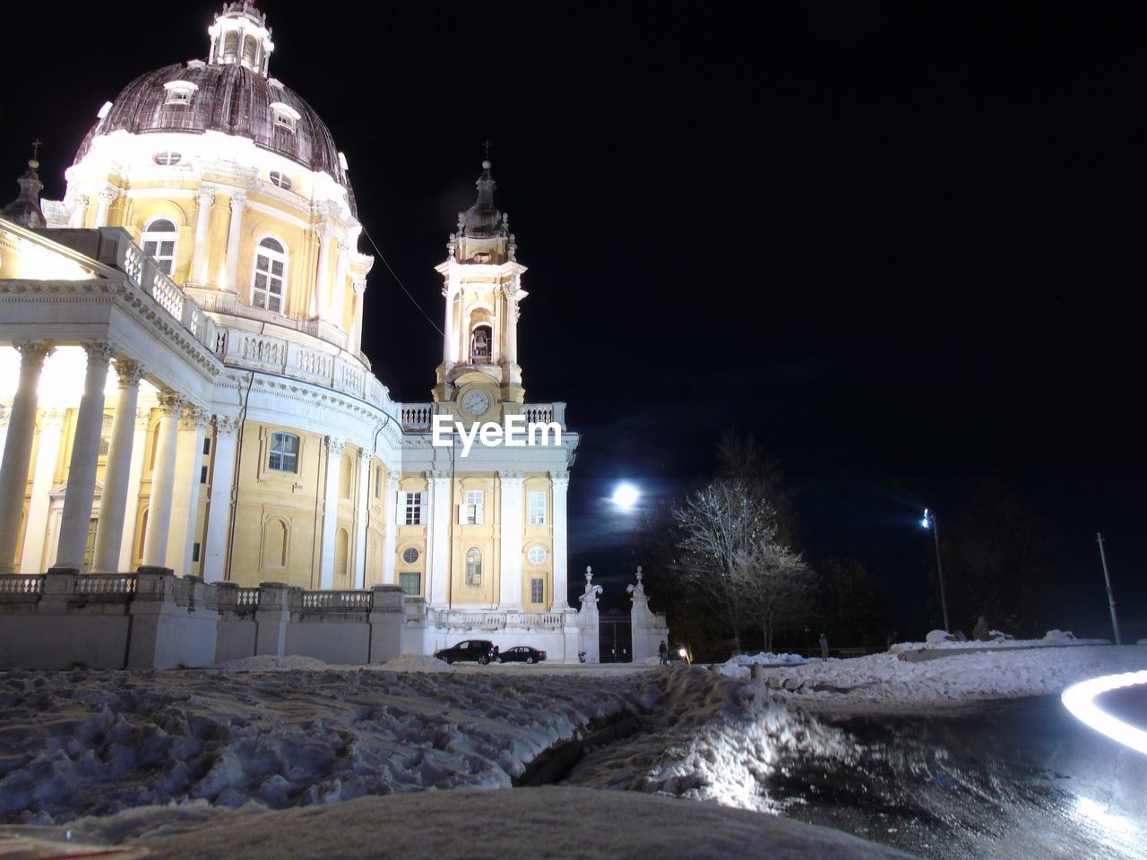 VIEW OF ILLUMINATED CATHEDRAL DURING WINTER