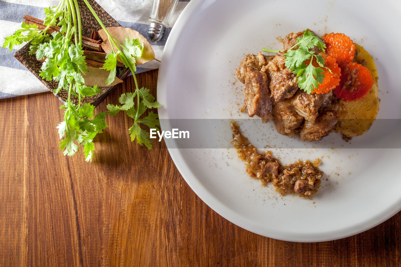 directly above shot of food in plate on table